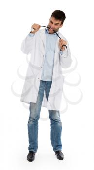 Humorous portrait of a young depressed surgeon with a stethoscope, isolated on white