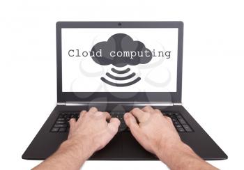 Man working on laptop, cloud computing, isolated