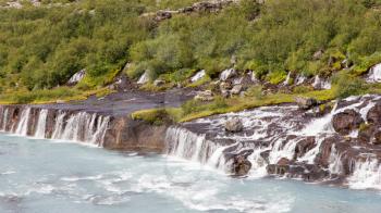 Hraunfossar waterfalls and cascade, a popular tourist destination in western Iceland