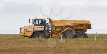 Mining dump truck working in a field in Iceland