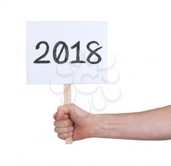 Sign with a number, isolated on white - The year 2018
