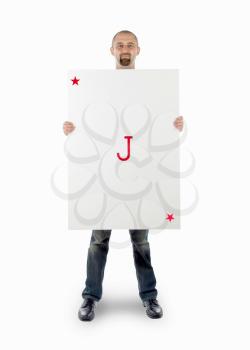 Businessman with large playing card - Joker red