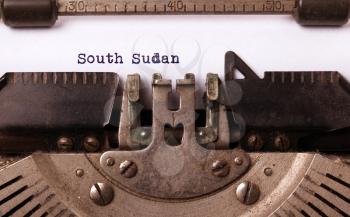 Inscription made by vintage typewriter, country, South Sudan