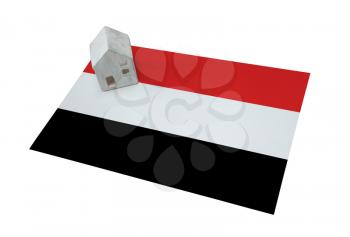 Small house on a flag - Living or migrating to Yemen