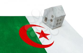 Small house on a flag - Living or migrating to Algeria