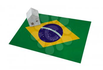 Small house on a flag - Living or migrating to Brazil