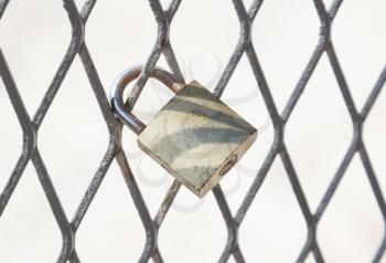 Love padlock on a fence in Greece