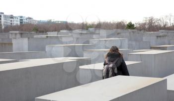 Berlin, Germany on december 30, 2019: Holocaust monument. View in the field from concrete slabs of the different size and height. City sights, tourist place