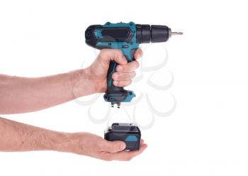 Cordless screwdriver or power drill isolated on a black background
