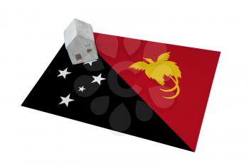 Small house on a flag - Living or migrating to Papua New Guinea