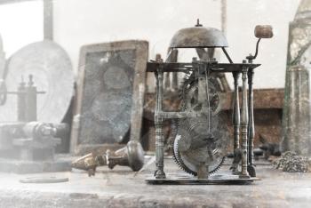 Old clock workshop, selective focus on the clock