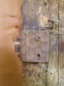 Old rusty lock in an abandoned house
