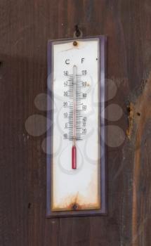 The thermometer made of wood isolated - Vintage thermometer