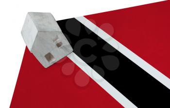 Small house on a flag - Living or migrating to Trinidad and Tobago