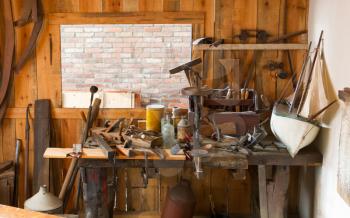 Collection of vintage woodworking tools on a rough workbench - Shed - Selective focus