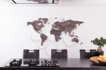 Roughly outlined world map on a kitchen wall