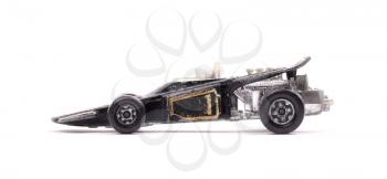 Black metal toy car, isolated on white