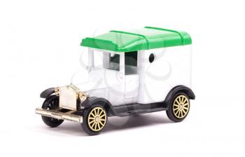 Old metal toy car, isolated on white