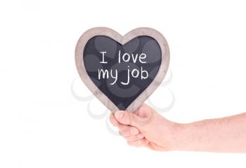 Adult holding heart shaped chalkboard - Isolated on white - Love my job