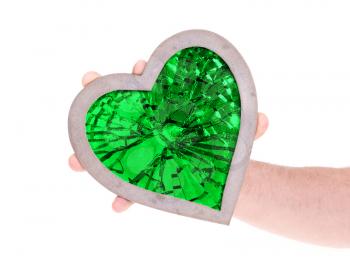 Adult holding heart filled with a large green ruby - Isolated on white
