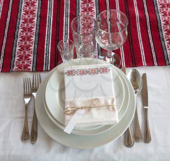 Empty glasses and plate, wedding setting, Romania