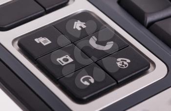 Buttons on a keyboard, selective focus on the middle right button - Telephone