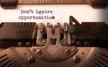 Vintage inscription made by old typewriter, don't ignore opportunities