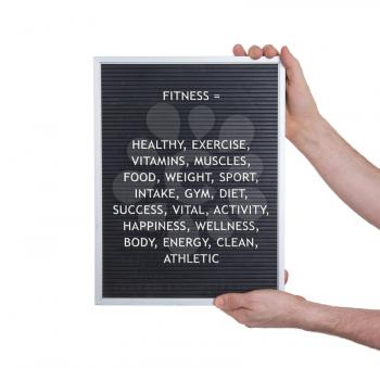 Fitness concept in plastic letters on very old menu board, vintage look