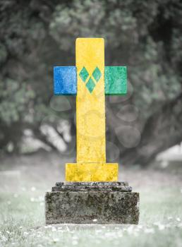 Old weathered gravestone in the cemetery - Saint Vincent and the Grenadines