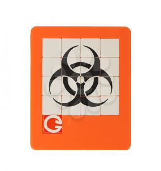 Old puzzle slide game, isolated on white - biohazard symbol