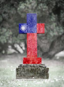 Old weathered gravestone in the cemetery - Taiwan