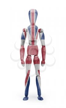 Wood figure mannequin with flag bodypaint on white background - United Kingdom