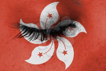 Women eye, close-up, tear, flag of Hong Kong