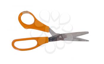 Old dirty scissors on a white background
