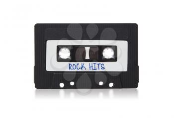 Vintage audio cassette tape, isolated on white background, rock hits