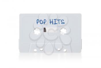 Vintage audio cassette tape, isolated on white background, Pop hits