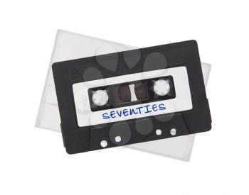 Vintage audio cassette tape, isolated on white background, best of the 70s