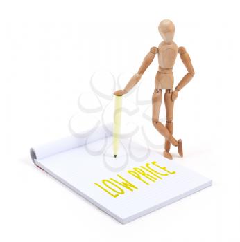 Wooden mannequin writing in a scrapbook - Low price