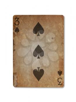 Very old playing card isolated on a white background, three of spades