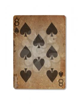 Very old playing card isolated on a white background, eight of spades