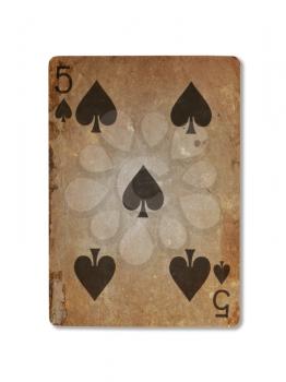 Very old playing card isolated on a white background, five of spades
