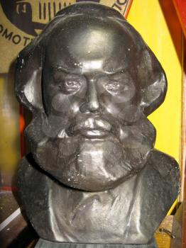 The image of bronze Karl Marx bust in a museum