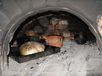 image of tasty ruddy easter bread cooking in the furnace