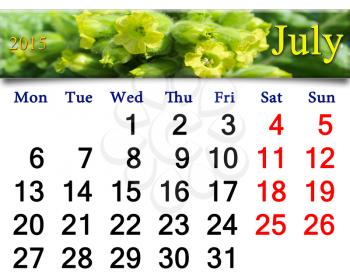 calendar for the July of 2015 on the background of flowers of tobacco-plant