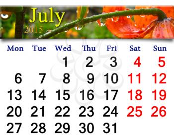 calendar for the July of 2015 with drops of water on red lilies