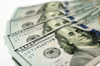 hundred dollar bank notes with image of president Benjamin Franklin