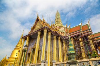 Grand Palace and Wat Phra Kaew (Temple of the Emerald Buddha) in Bangkok in a summer day