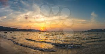 Panorama of Patong beach and Andaman sea on Phuket in Thailand during sunset