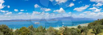 Panorama of Sirmione on lake Garda in a beautiful summer day, Italy