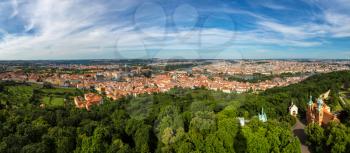 Panoramic aerial view of Charles Bridge in Prague in a beautiful summer day, Czech Republic
